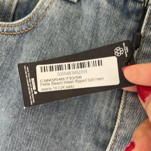 PETITE BLEACH WASH RIPPED SPLIT HEM JEANS - Picture 5 of 5